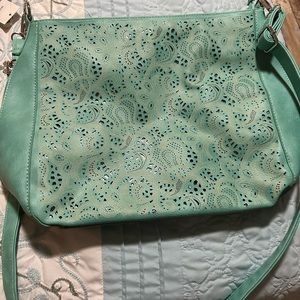 Teal purse brand new with tags locked zipper on each side